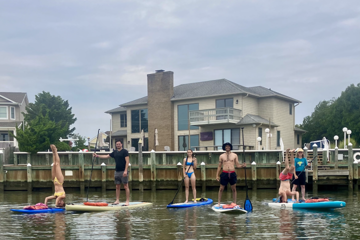 a group of people on a boat in the water