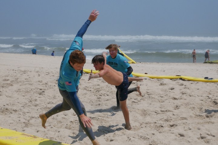a group of people on a beach