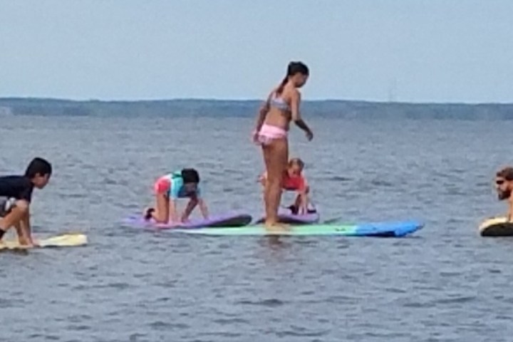 a group of people in a body of water