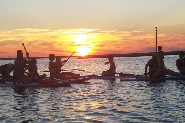 a person sitting on a boat in the water